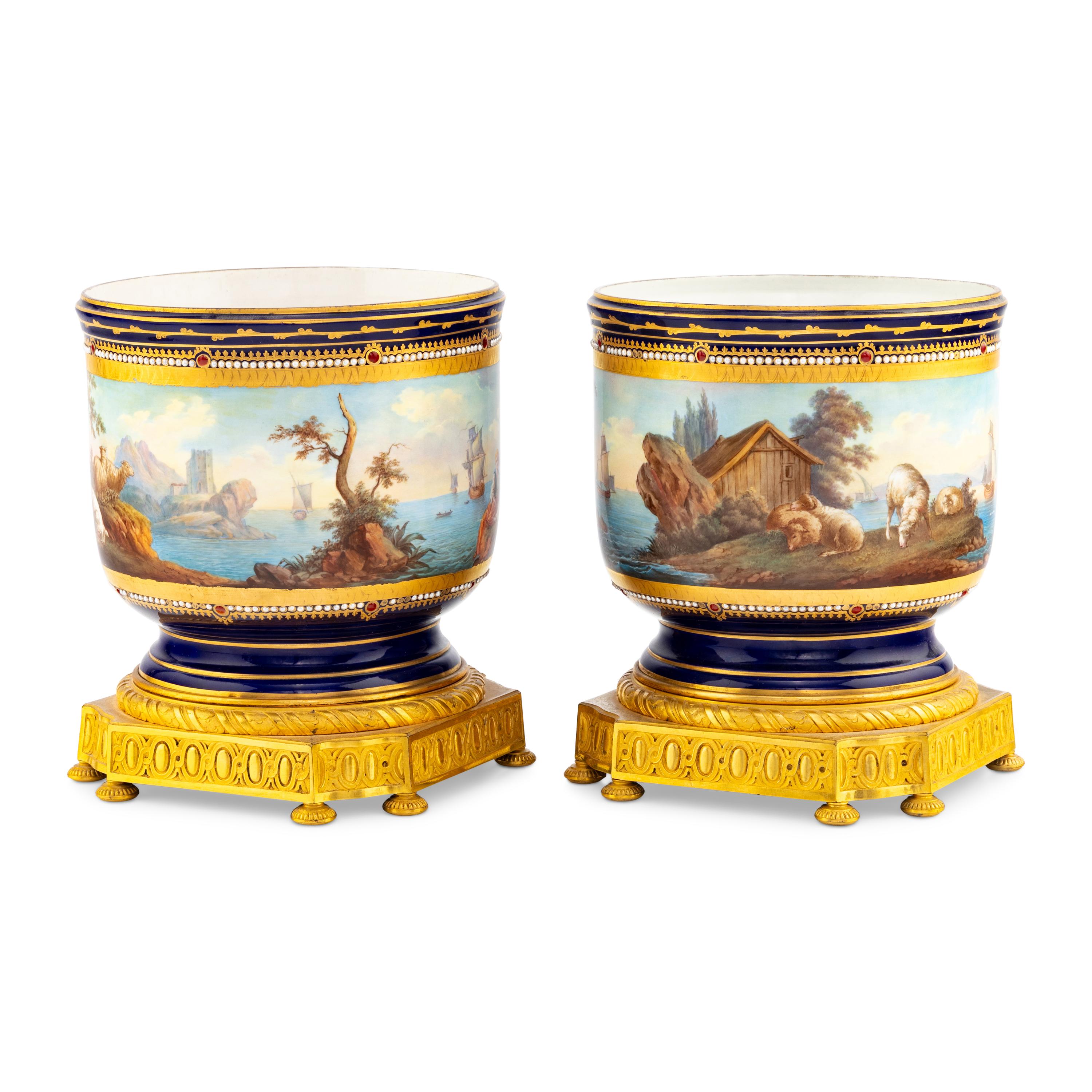 A Pair of Sèvres Style Gilt Bronze Mounted Porcelain Cache Pots