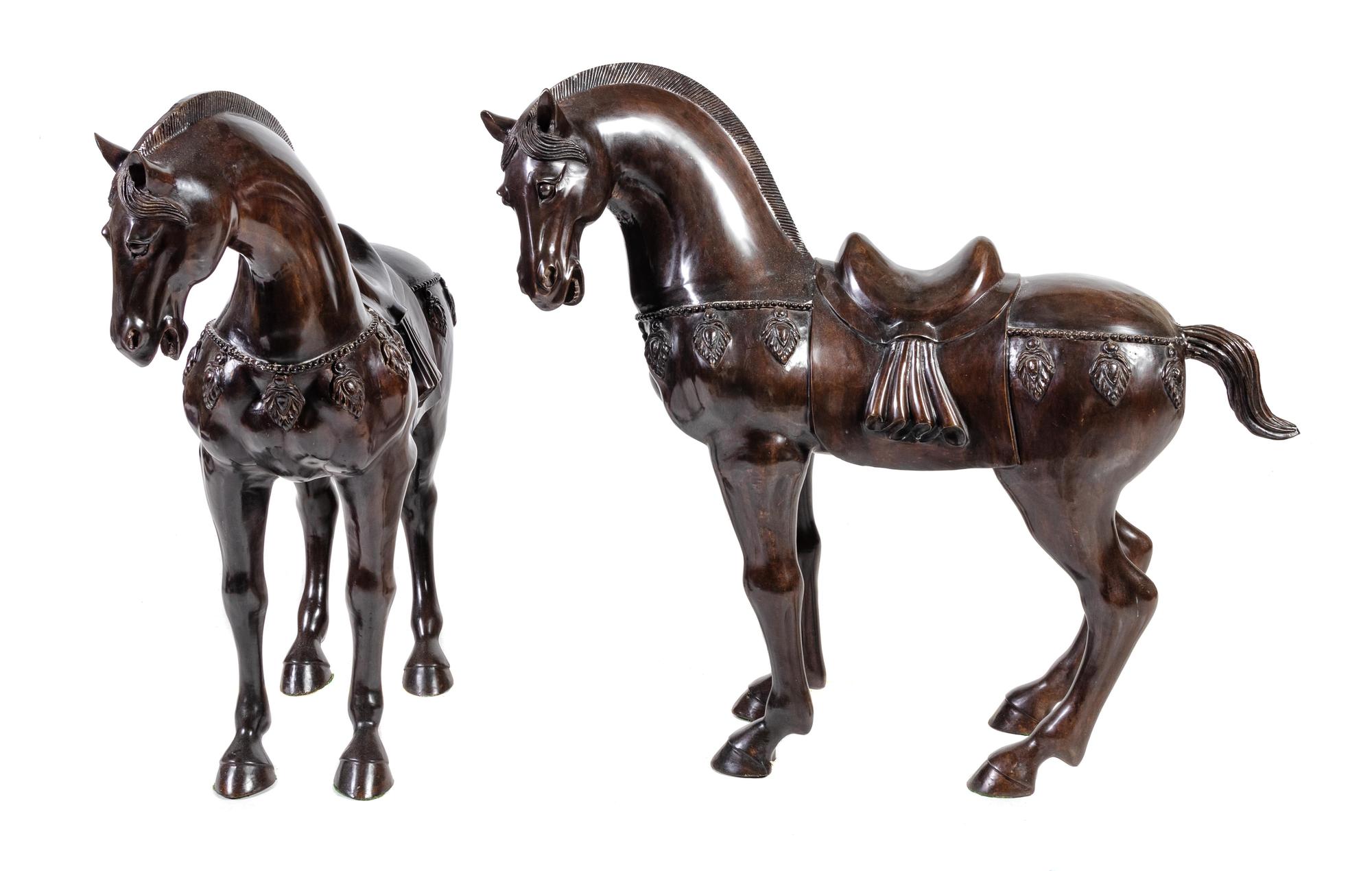 A Pair of Bronze Models of Horses