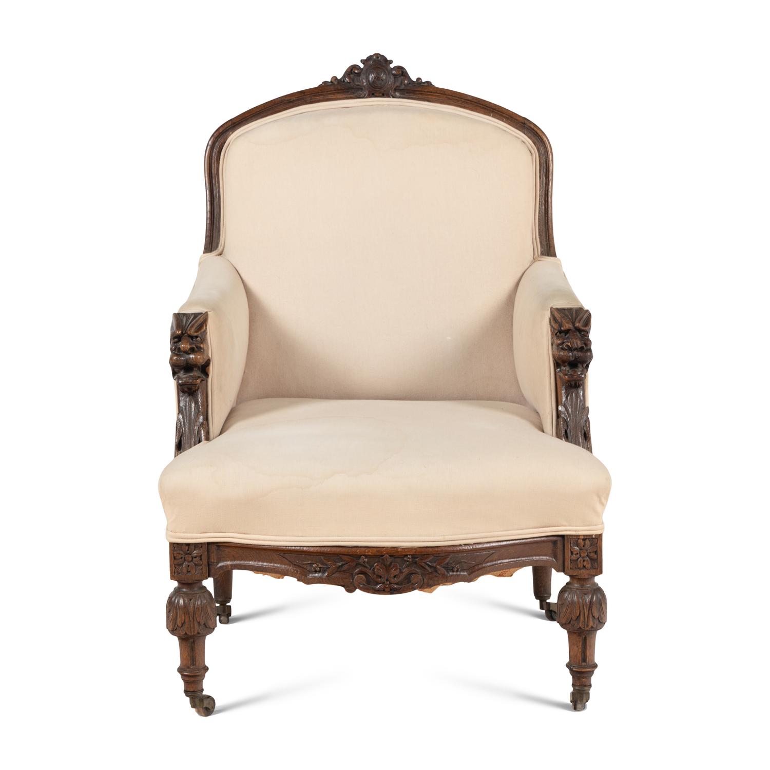 A Renaissance Revival Carved Oak Bergère