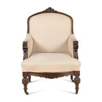 A Renaissance Revival Carved Oak Bergère