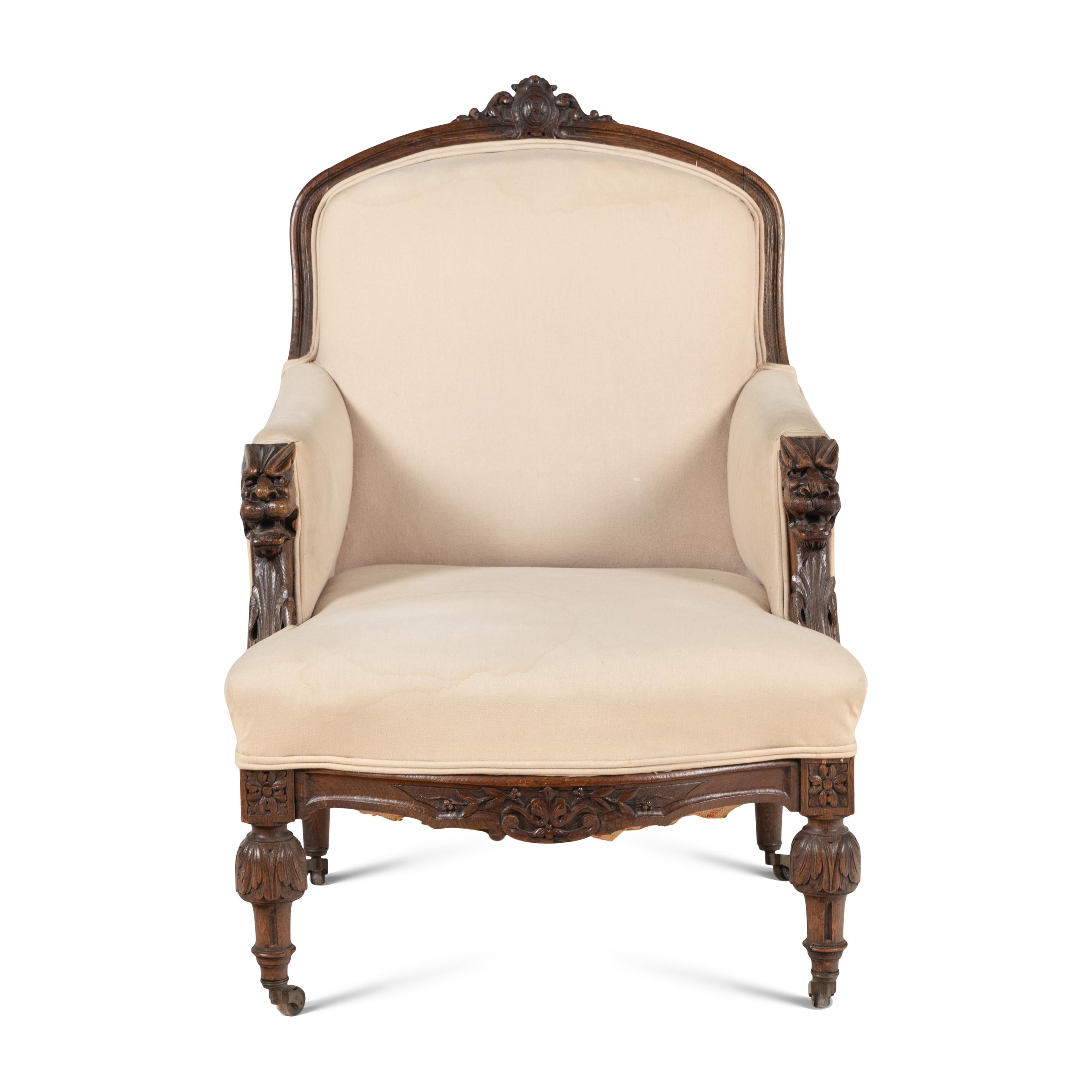 A Renaissance Revival Carved Oak Bergère