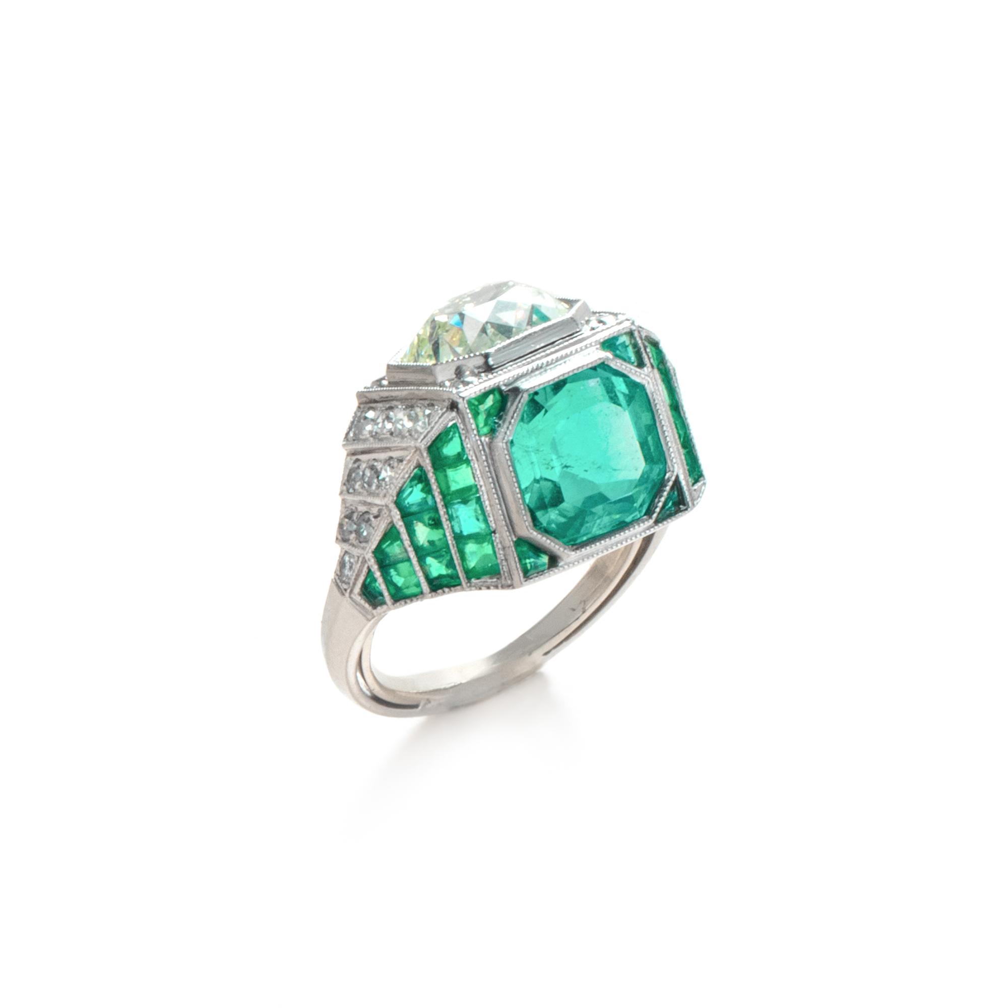 ART DECO, EMERALD AND DIAMOND SCULPTURAL 'TOI ET MOI' RING
