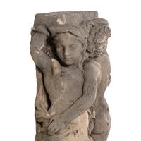 A Cast Stone Garden Figural Group