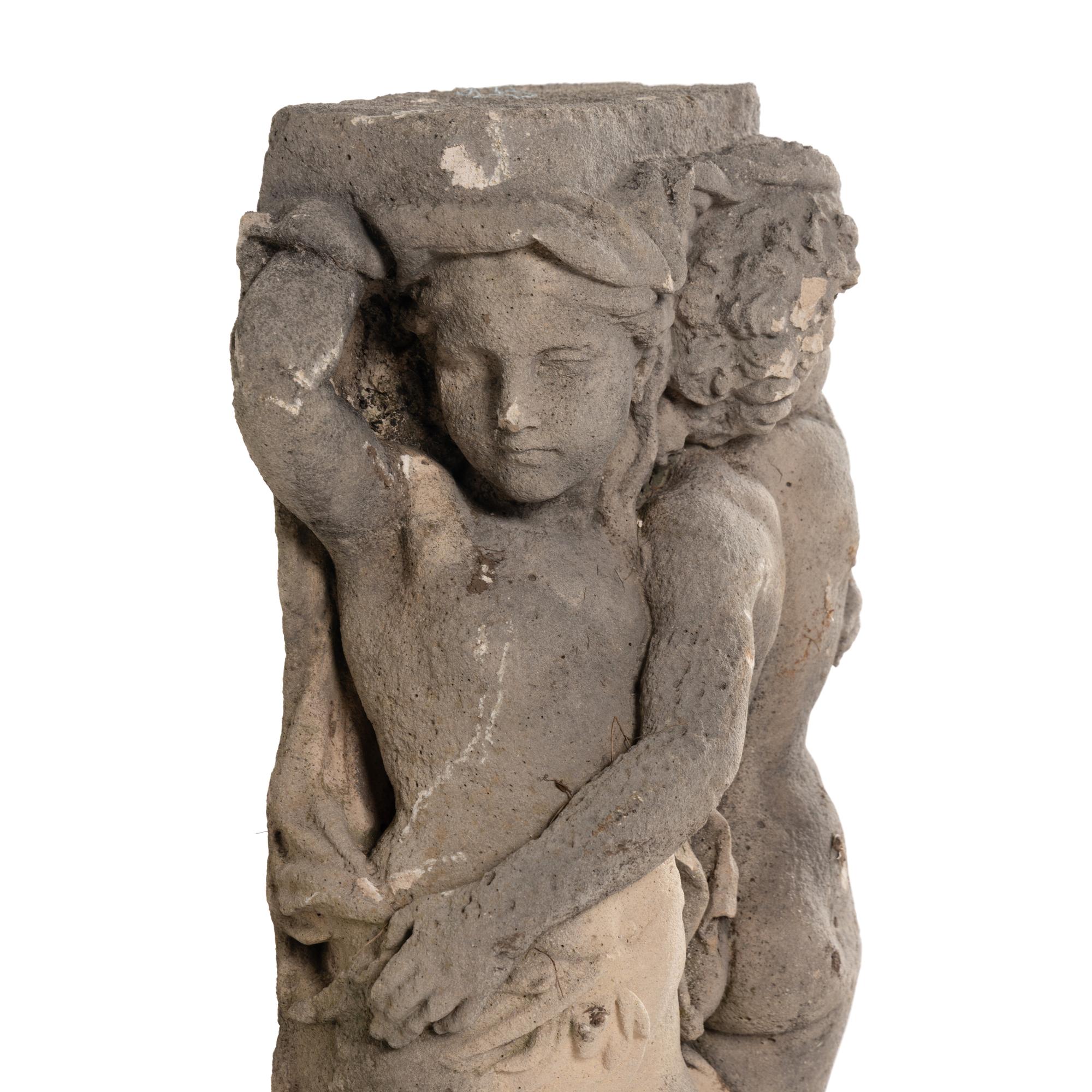 A Cast Stone Garden Figural Group