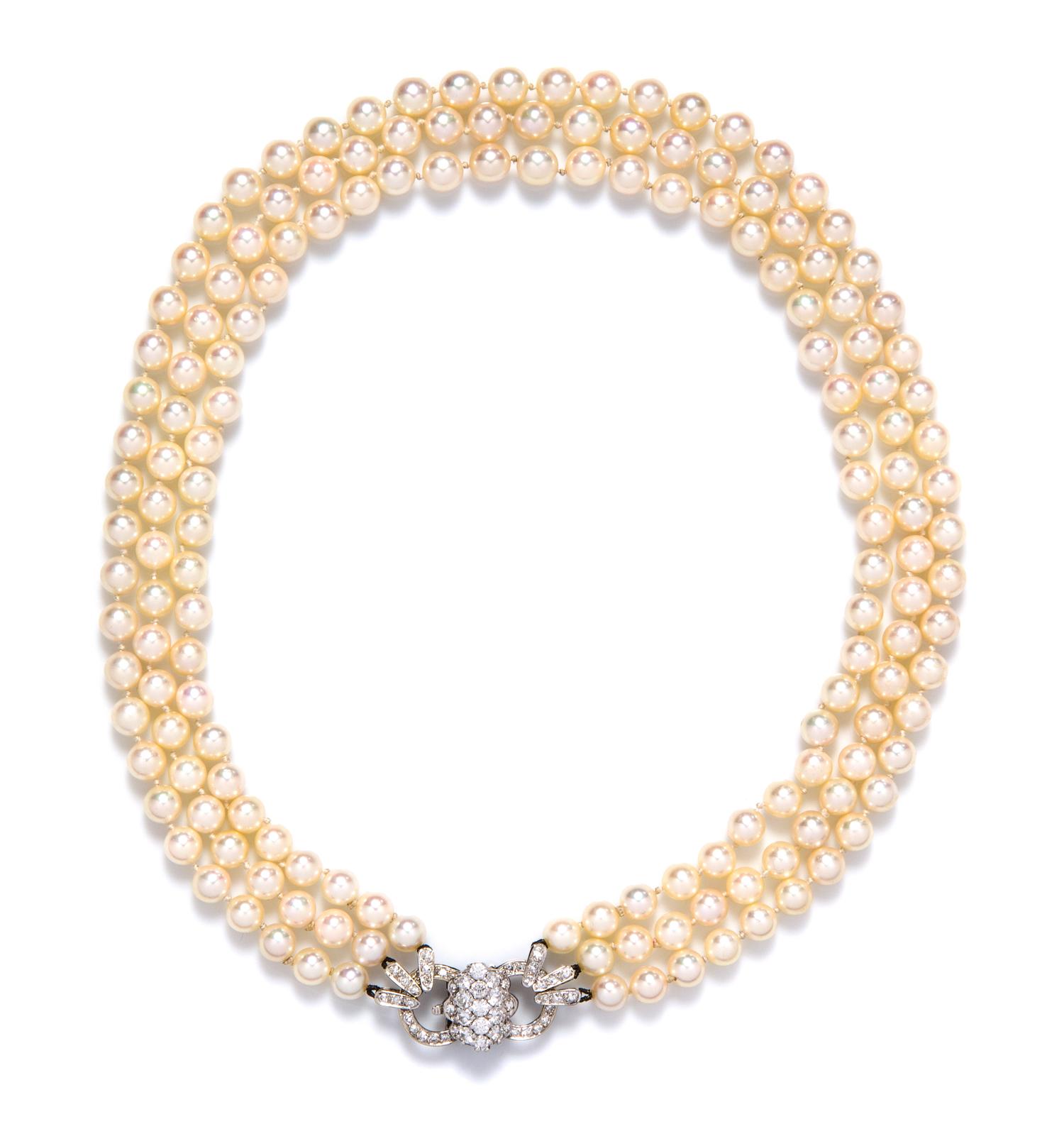 An Vintage White Gold, Diamond and Cultured Pearl Triple Strand Necklace, French, 40.90 dwts.