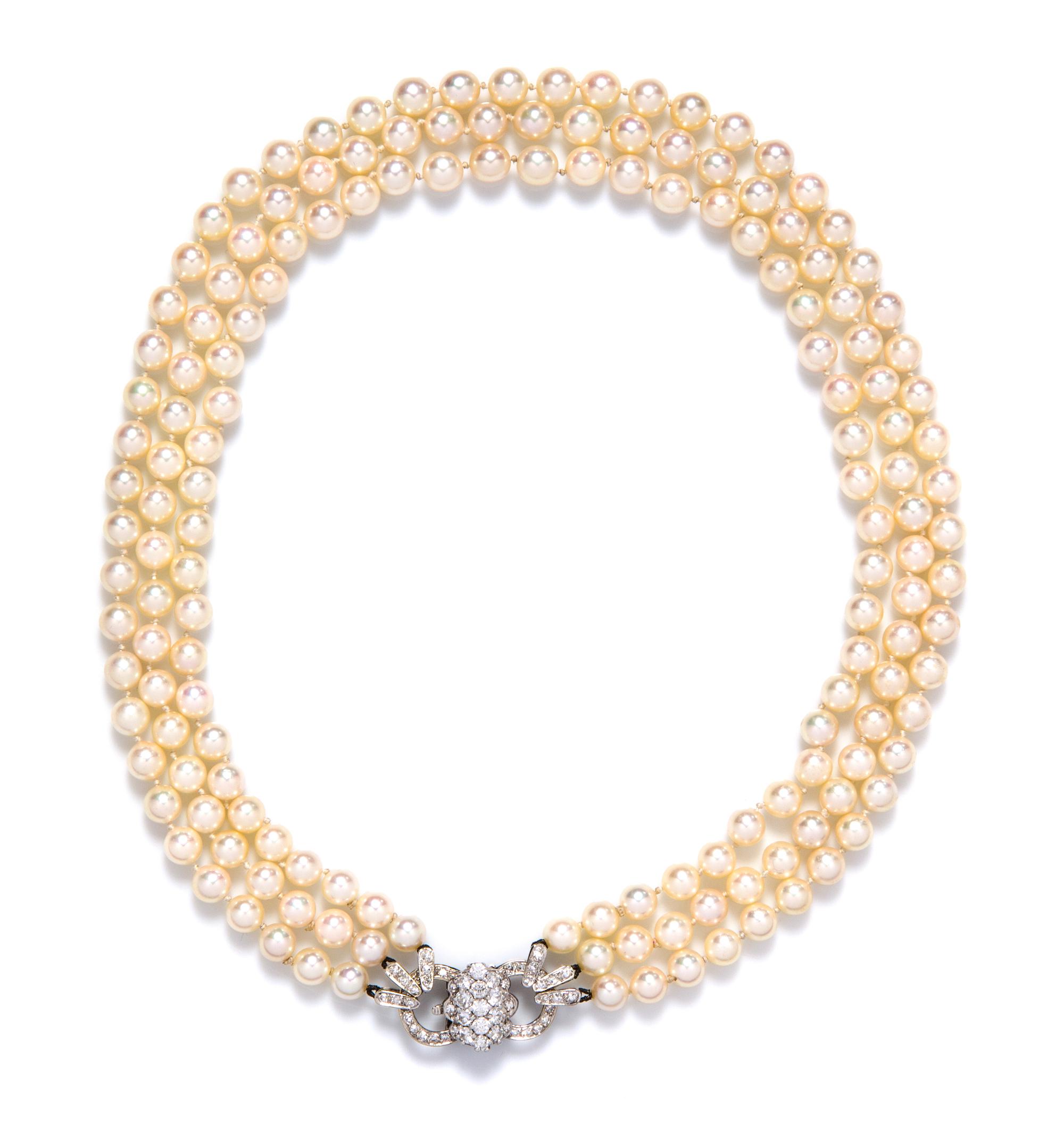 An Vintage White Gold, Diamond and Cultured Pearl Triple Strand Necklace, French, 40.90 dwts.