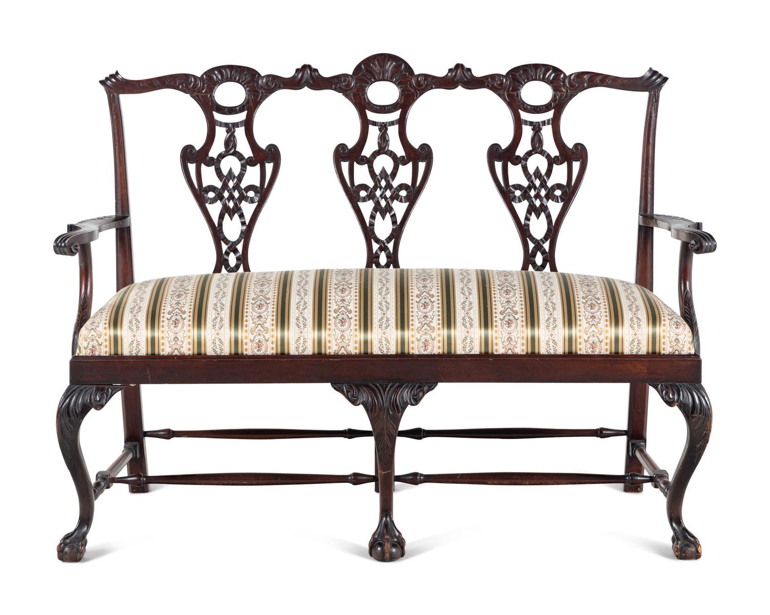 A George III Style Carved Mahogany Settee