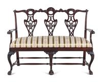A George III Style Carved Mahogany Settee