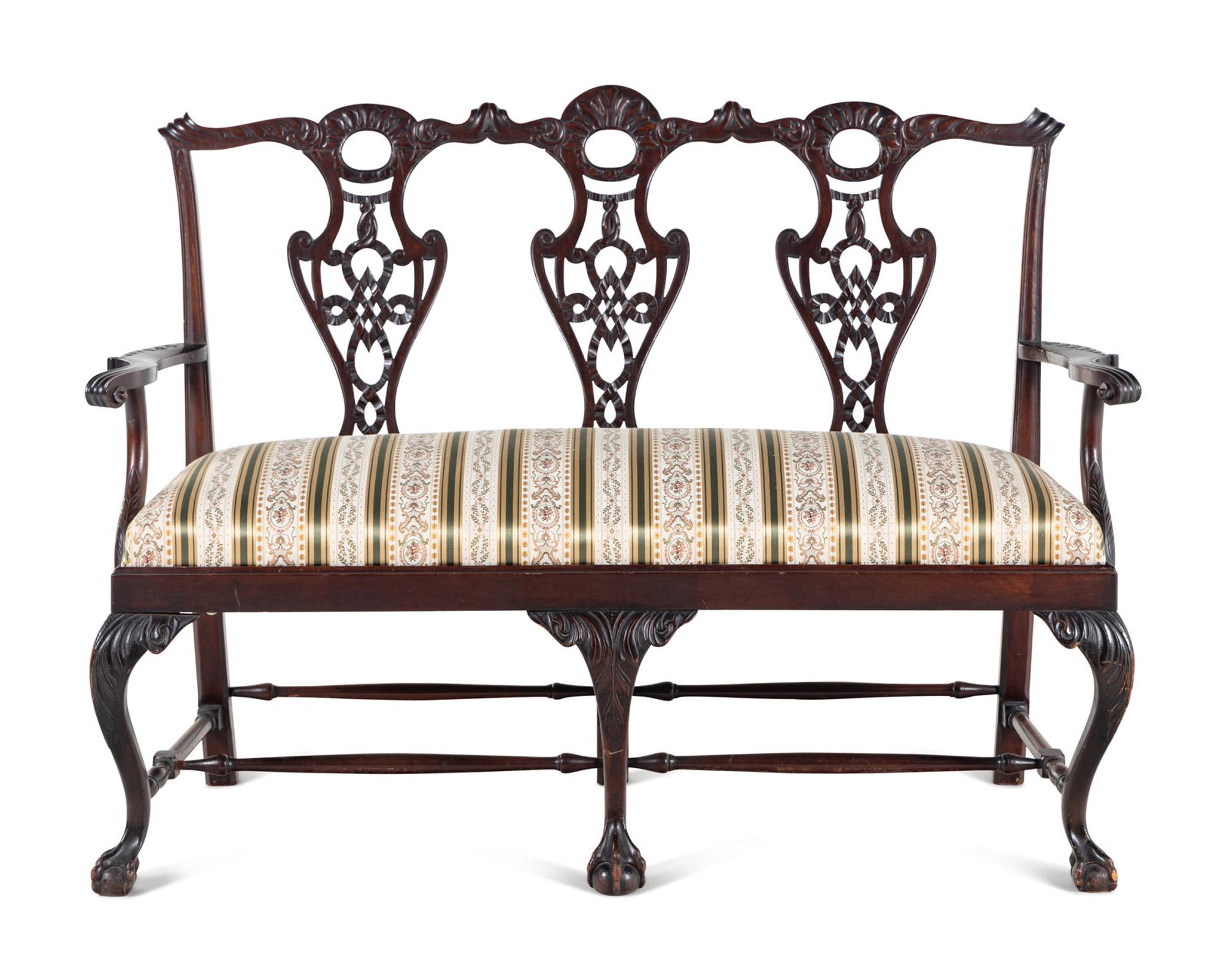 A George III Style Carved Mahogany Settee