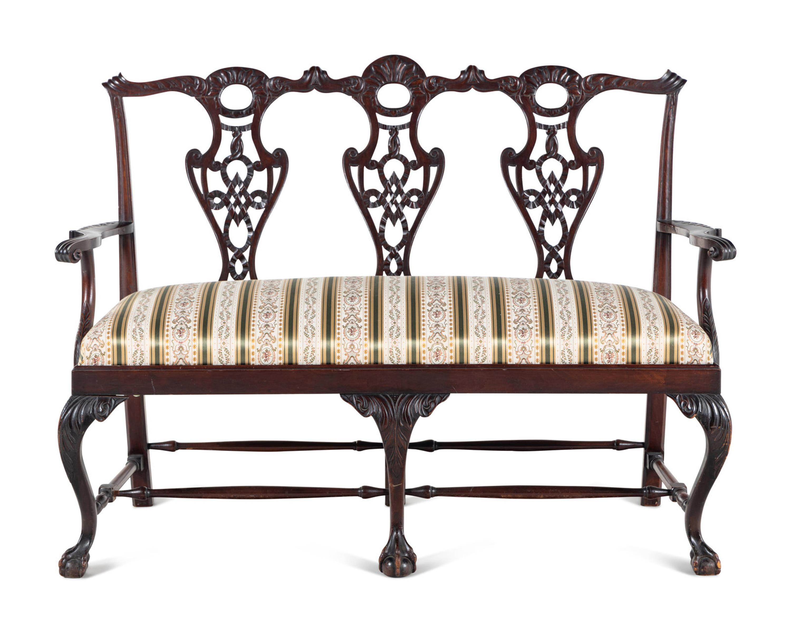 A George III Style Carved Mahogany Settee