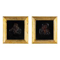 A Pair of Tobacco Themed Wax Portrait Profiles