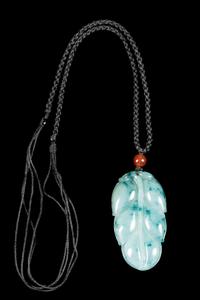 A Jadeite Leaf-Form Pendant Length 1 3/4 inches. — 20TH CENTURY