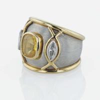 An 18K yellow gold, platinum, yellow sapphire, and diamond ring, Boris LeBeau