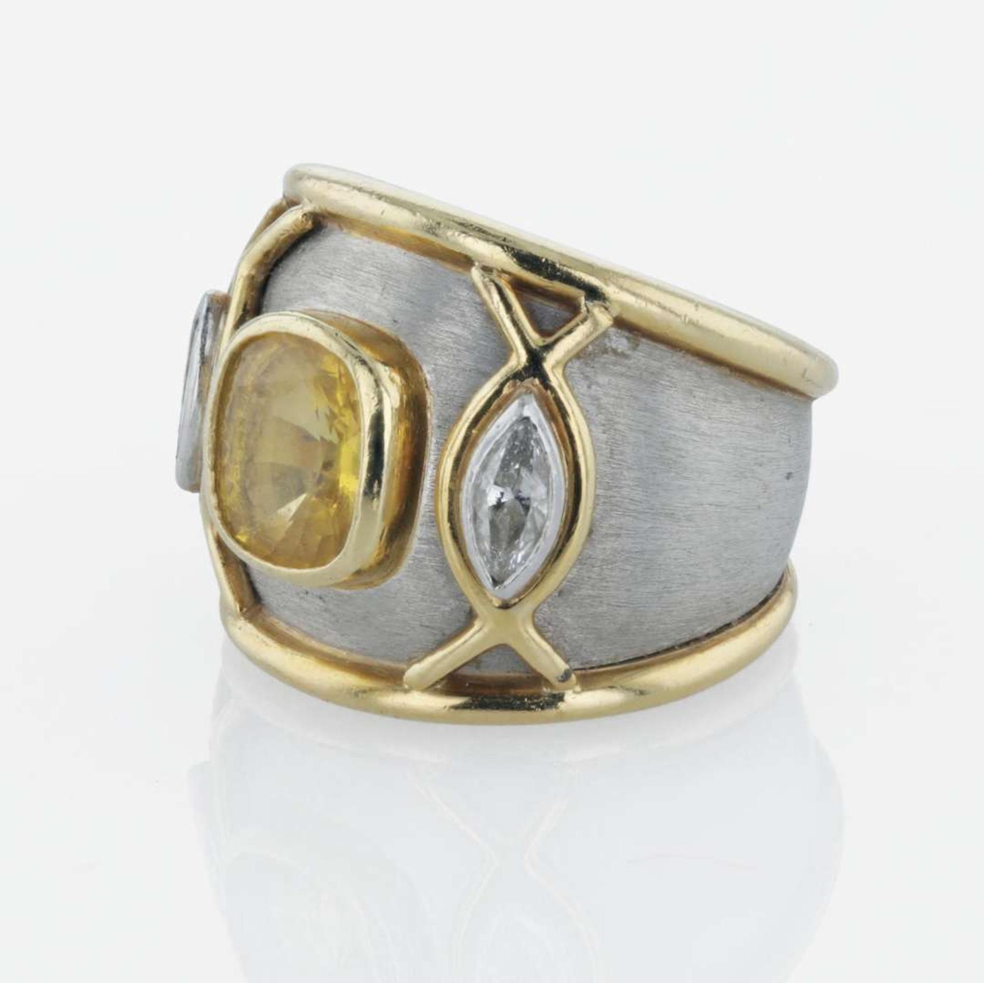 An 18K yellow gold, platinum, yellow sapphire, and diamond ring, Boris LeBeau