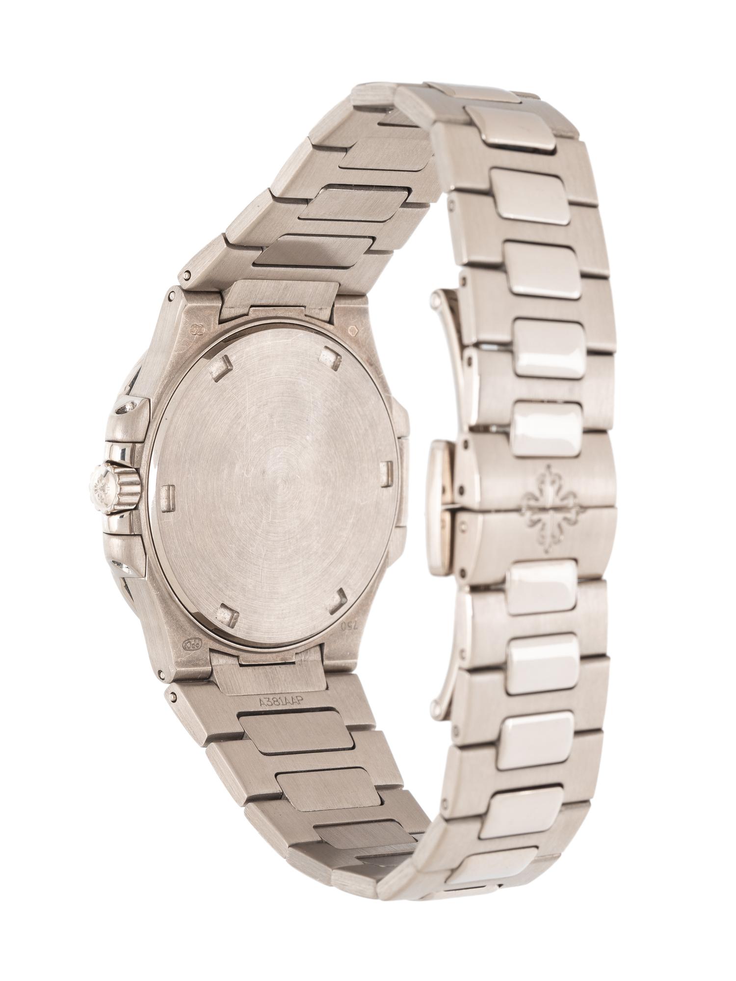 PATEK PHILIPPE, REF. 7010/1 18K WHITE GOLD 'NAUTILUS' WATCH WITH FACTORY DIAMOND BEZEL, EXTRACT FROM THE ARCHIVES