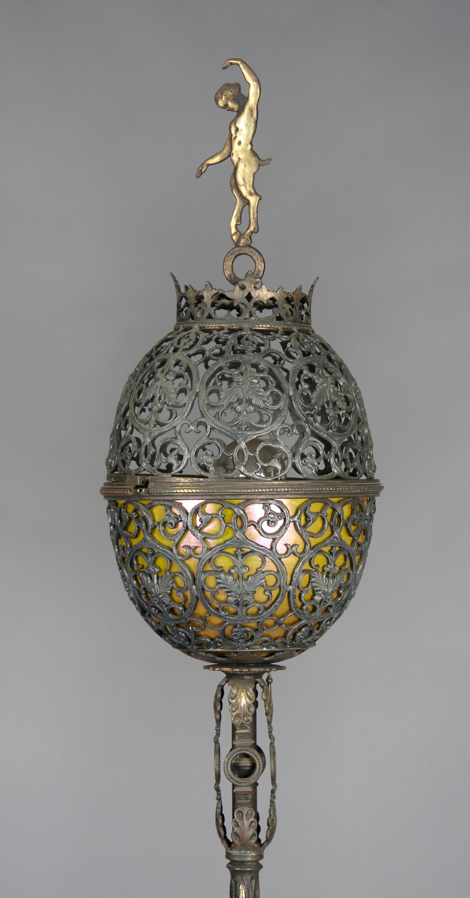 A Pair of Iron and Gilt Bronze Torcheres, Oscar B. Bach, Height 77 inches.