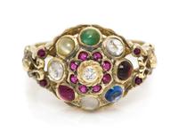 A 14 Karat Yellow Gold and Multigem Ring, 4.10 dwts.