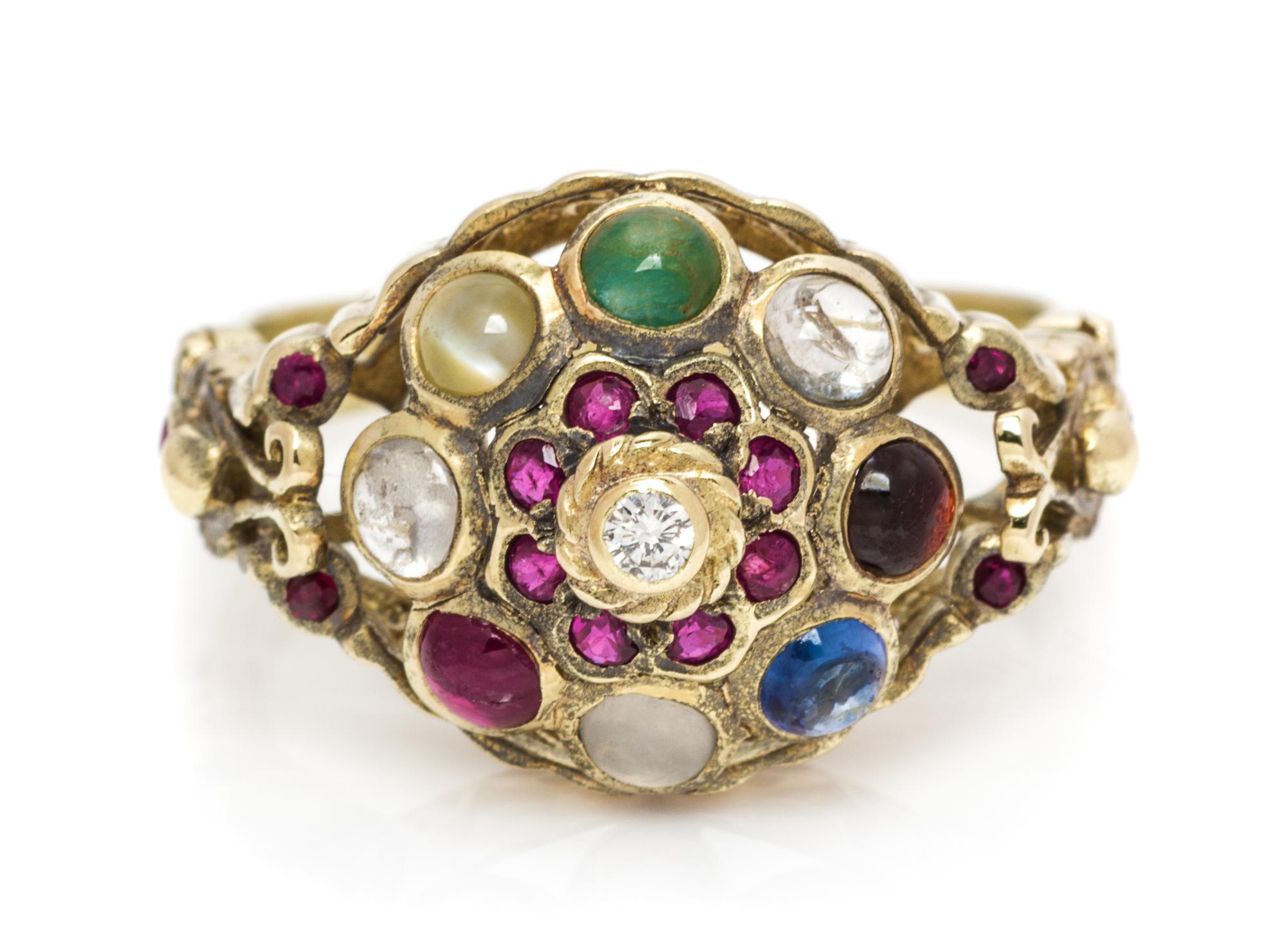 A 14 Karat Yellow Gold and Multigem Ring, 4.10 dwts.