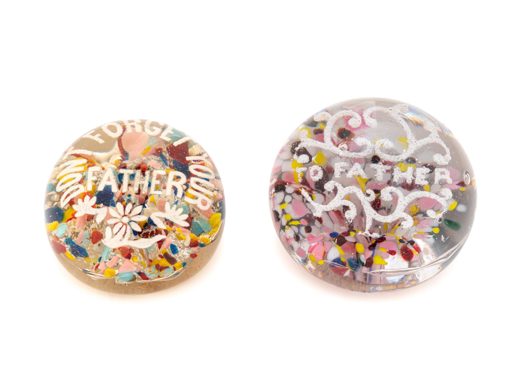 Two American Frit Father Motto Over Speckled Ground Glass Paperweights