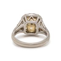 FANCY LIGHT YELLOW DIAMOND AND DIAMOND RING