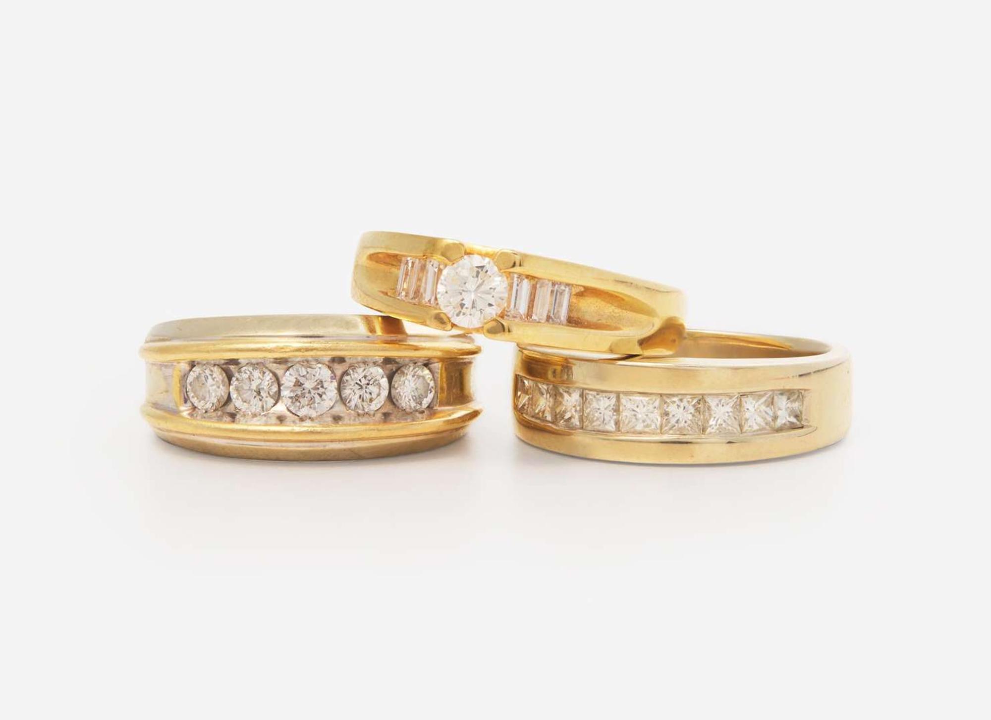 A Group of Men's Diamond Rings