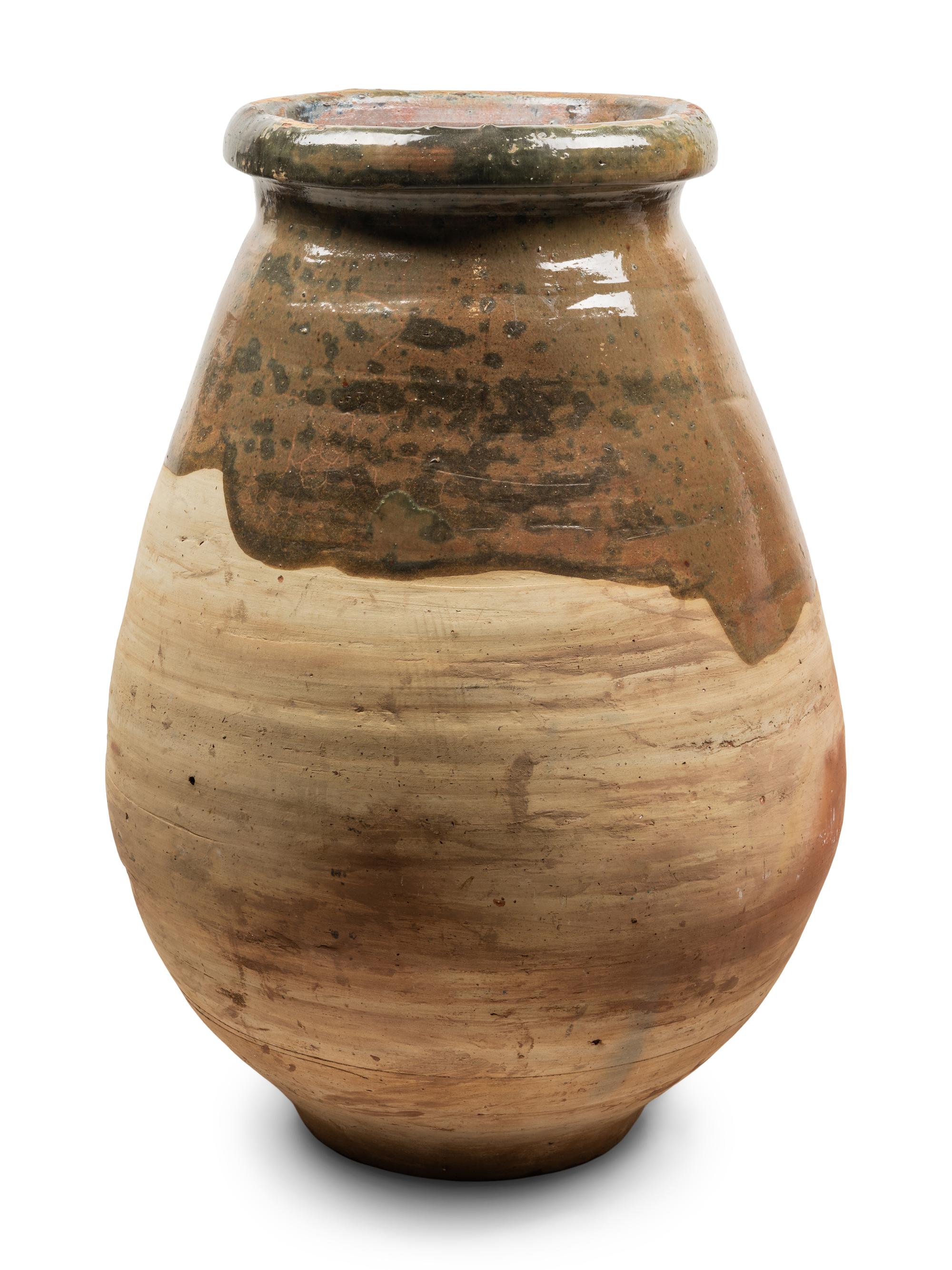 A Slip Glazed Pottery Storage Jar