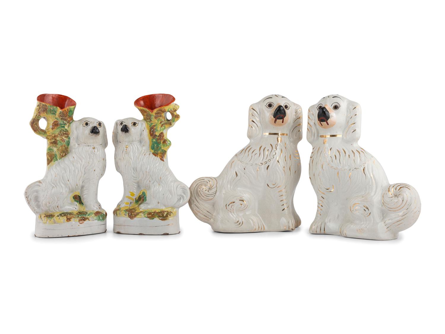 Four Staffordshire Glazed Earthenware Spaniels