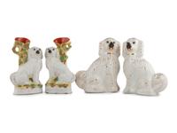 Four Staffordshire Glazed Earthenware Spaniels