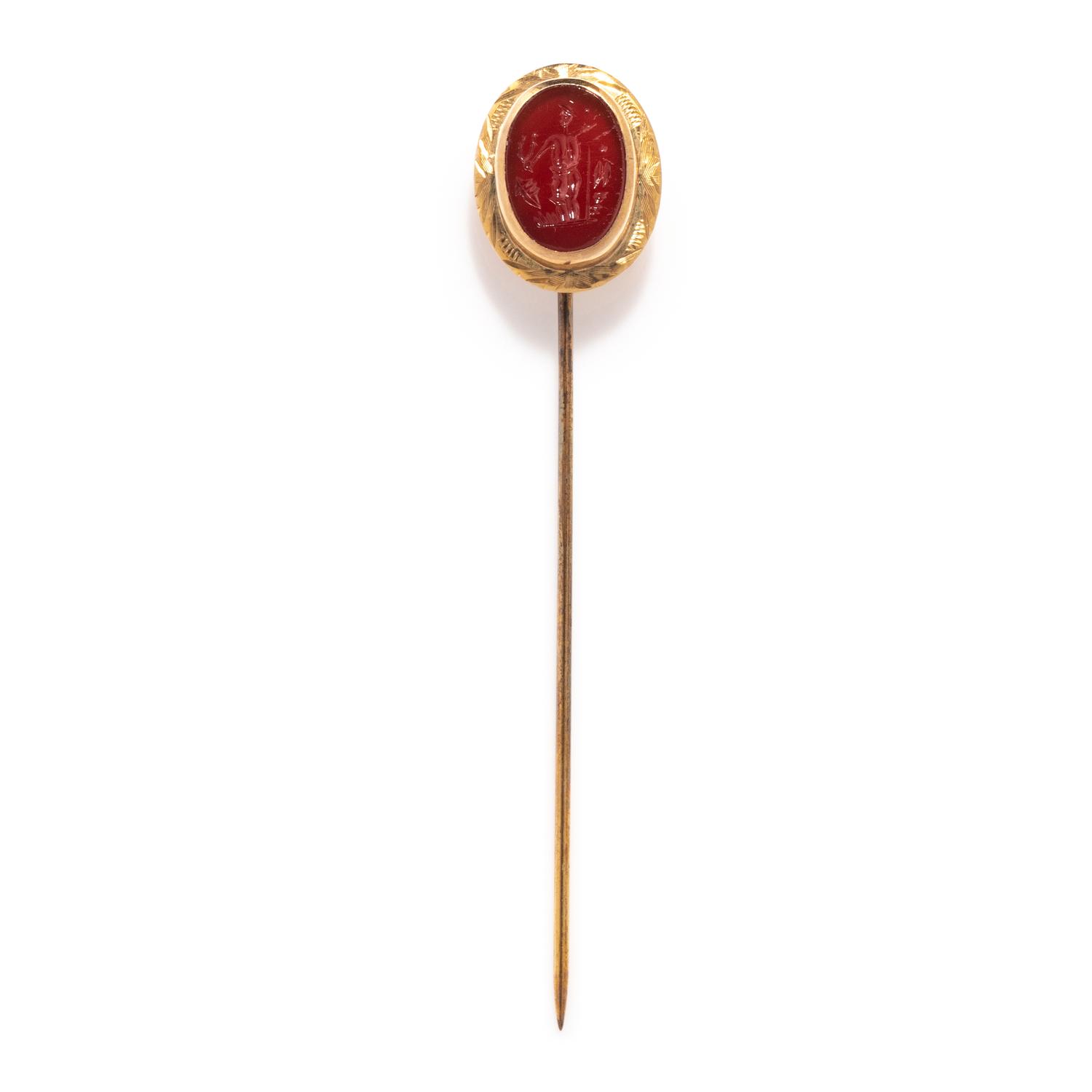 A Neoclassical Carnelian and Gold Stickpin with a Mythological Scene