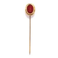 A Neoclassical Carnelian and Gold Stickpin with a Mythological Scene
