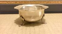 A George V Silver Footed Bowl, likely J H Worrall, Birmingham, 1912, having a scalloped rim and raised on three pad feet.