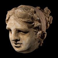 An Eastern Roman Stucco Head of a Woman