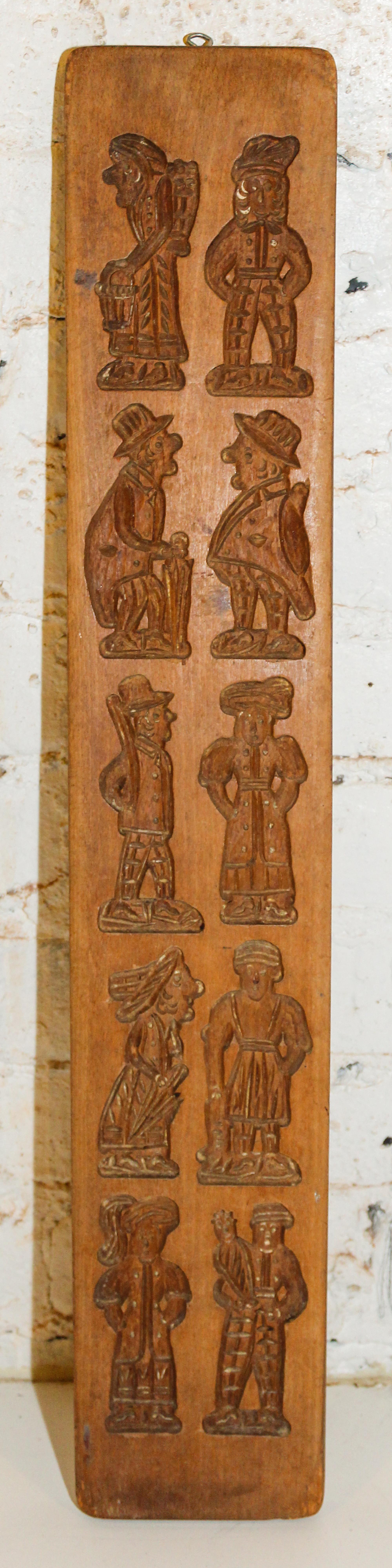 A Wood Mold Height 26 3/8 x width 4 5/8 inches.
