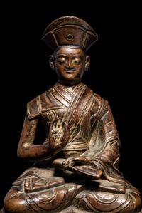 A Tibetan Bronze Figure of a Lama