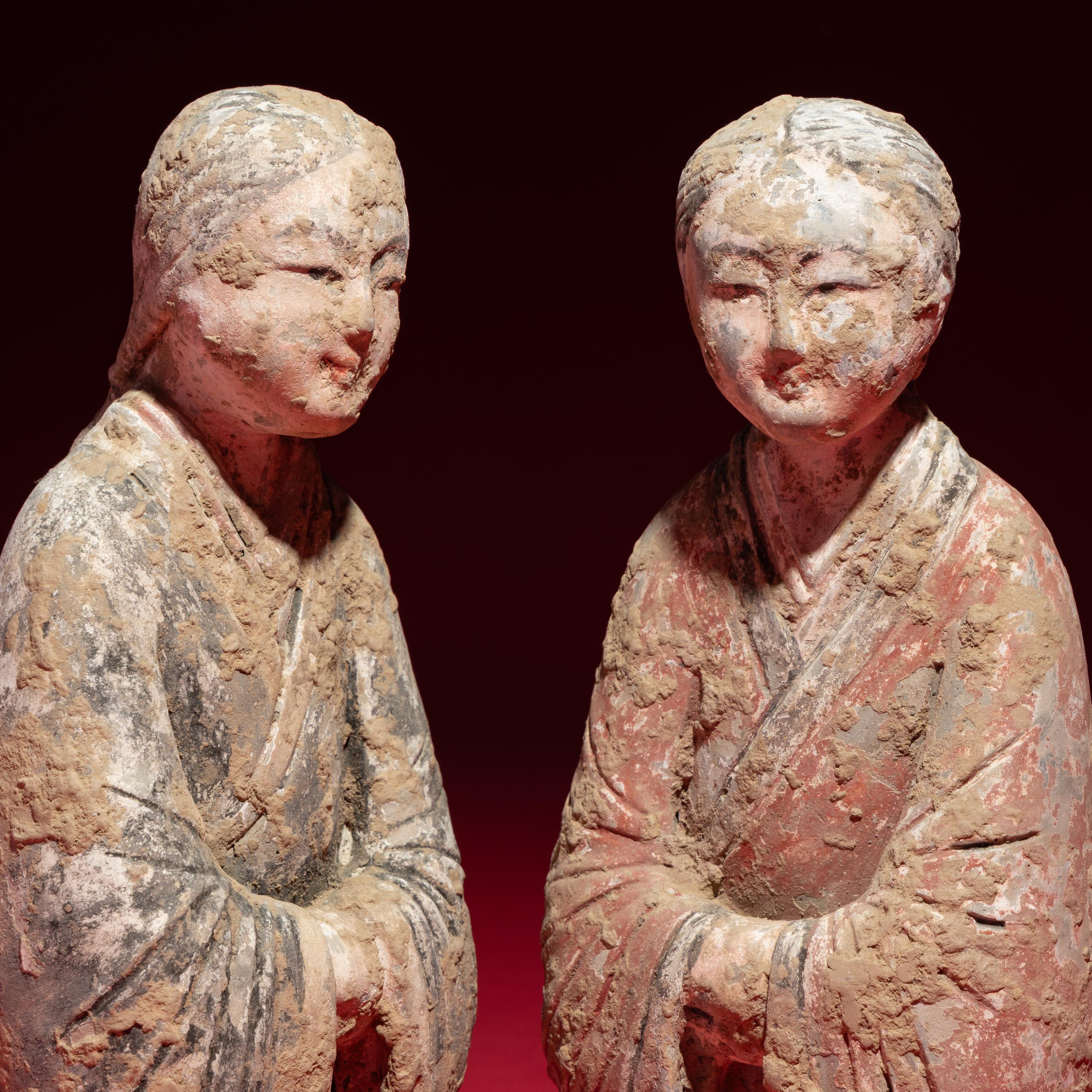 A Pair of Chinese Painted Pottery Kneeling Ladies, Western Han Dynasty — 西漢 陶彩繪跽坐女樂俑一對