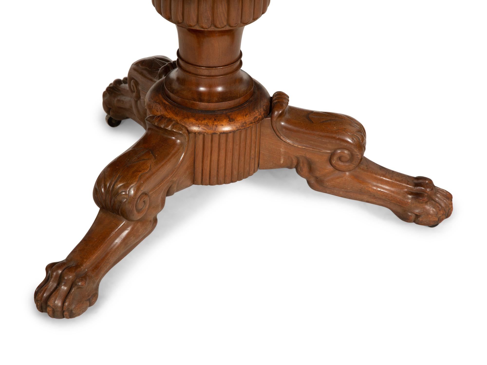 A Louis Philippe Mahogany Marble-Top Center Table