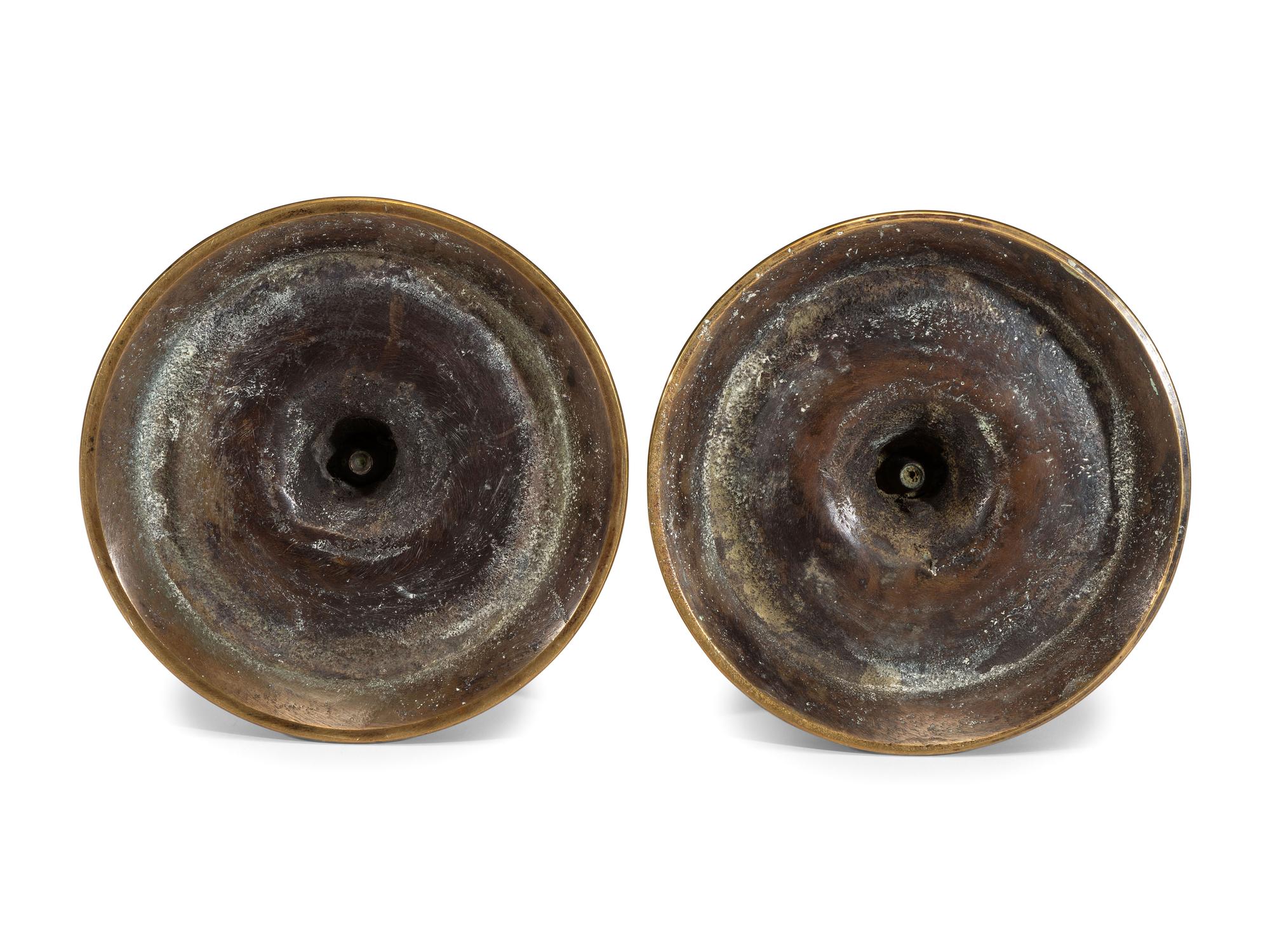 A Pair of Brass Tavern Candlesticks