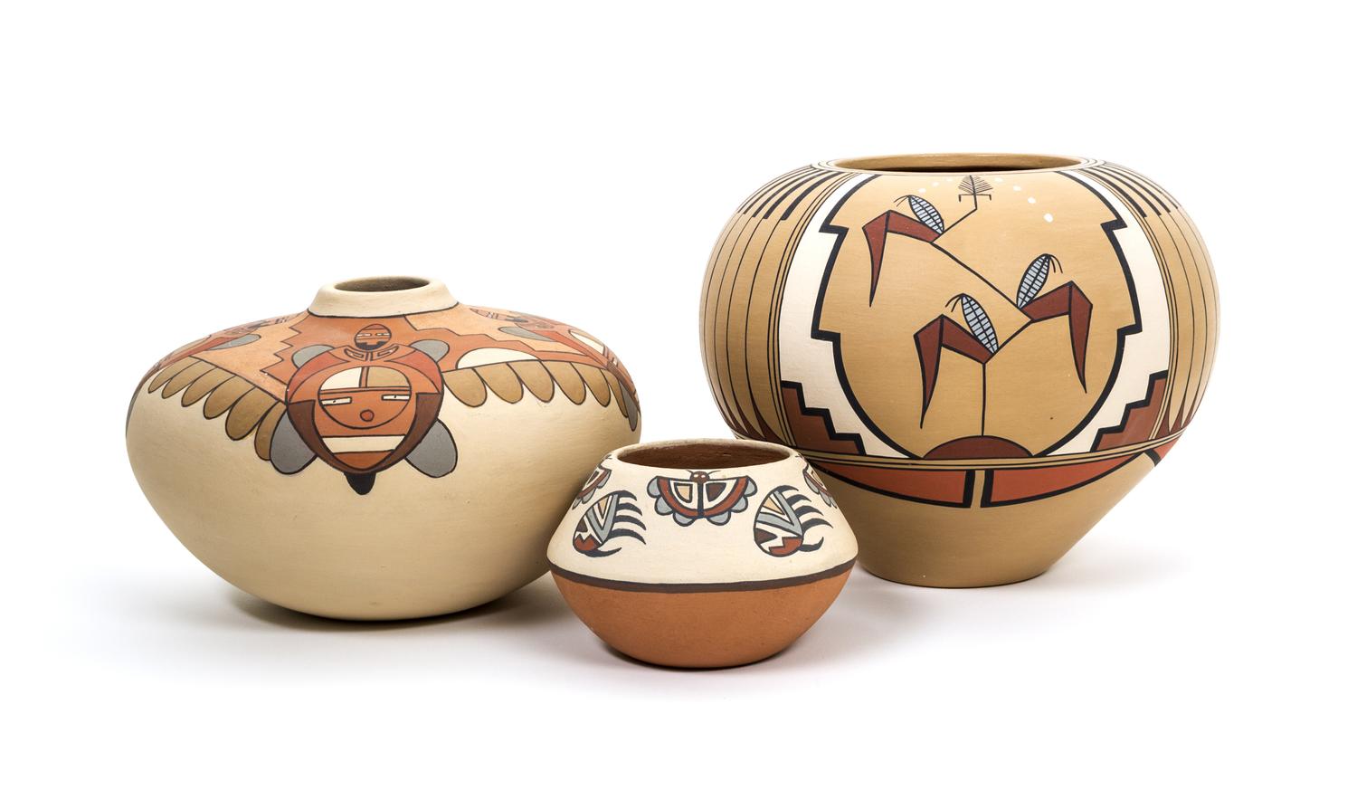 Three Nambe/ Pojoaque Jars First height 7 x diameter 9 1/2 inches.