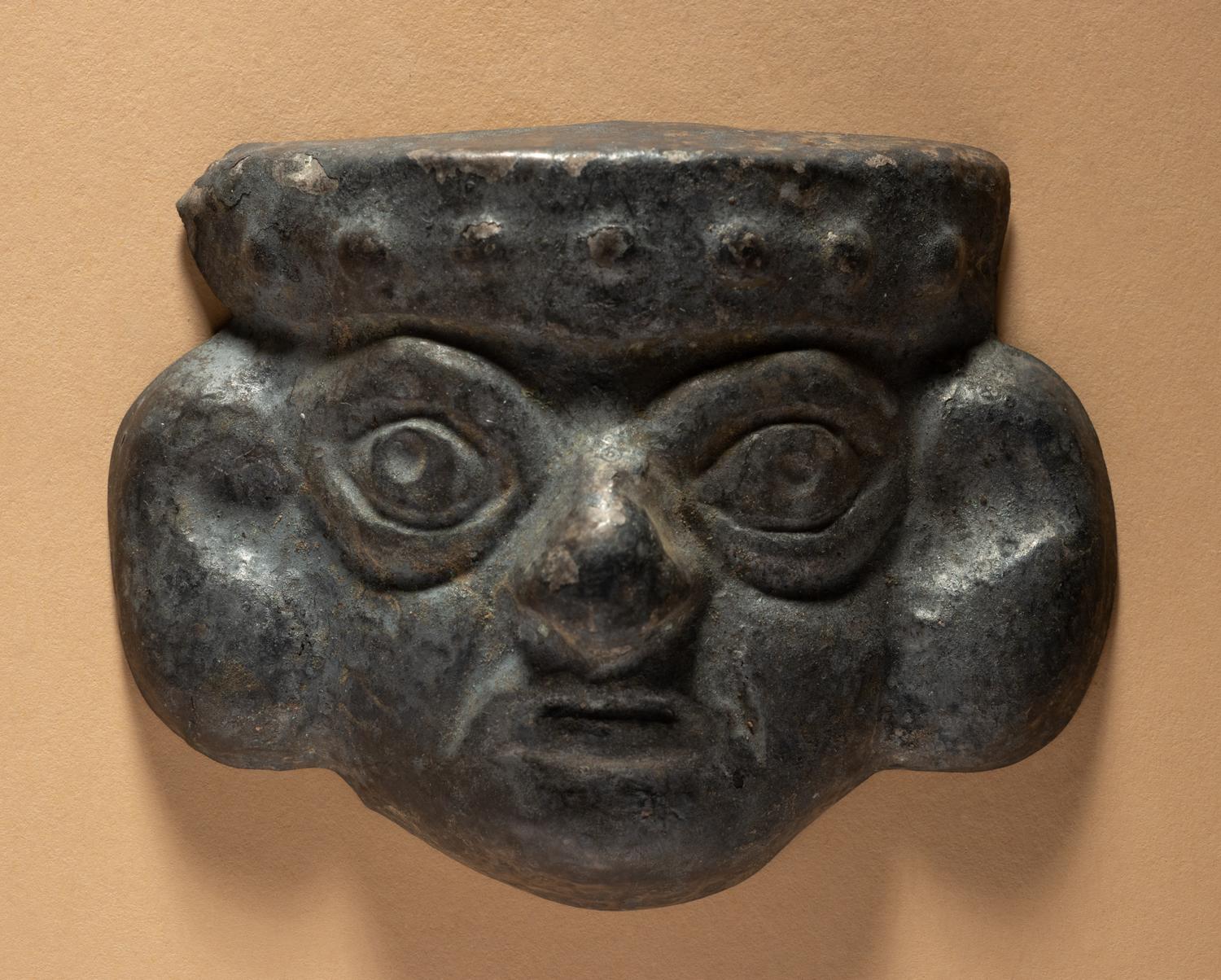 Two Moche Copper Masks