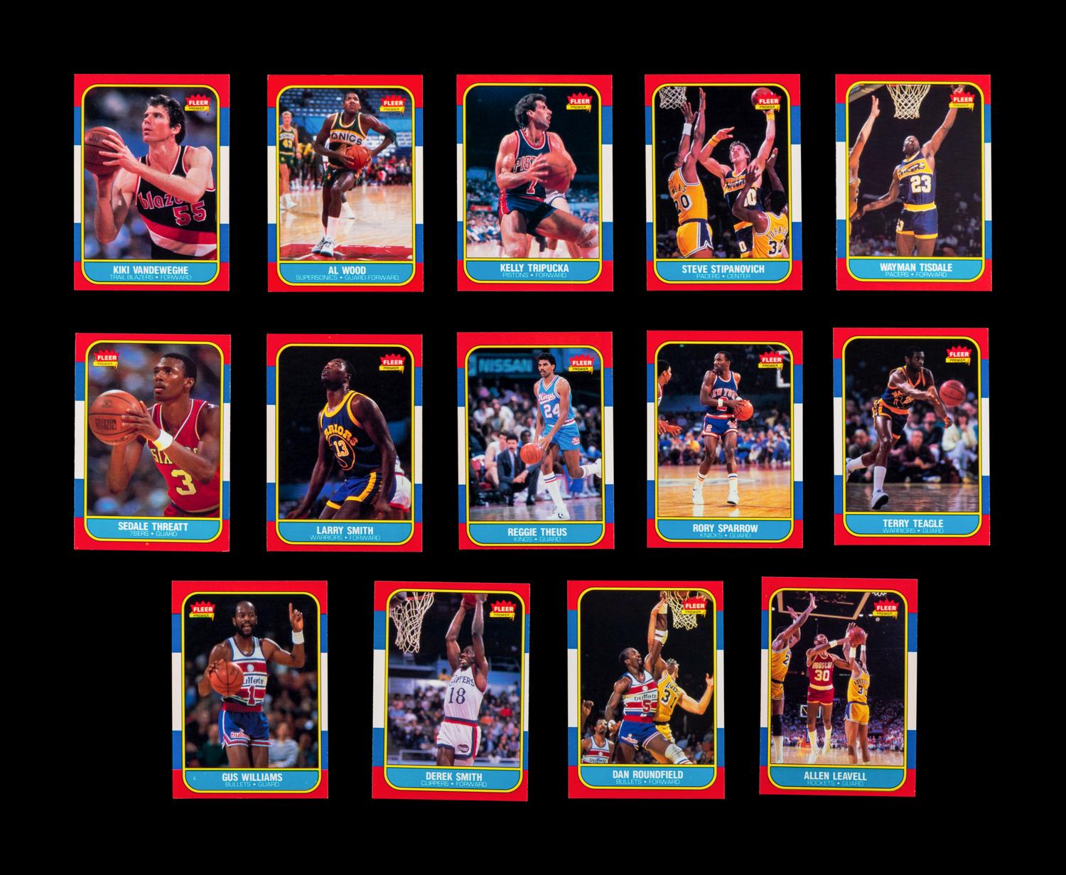 A Group of 54 1986 Fleer Basketball Cards, Including a Patrick Ewing Rookie No. 32, and Two Stickers