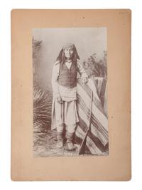 [NATIVE AMERICAN]. [WITTICK, Ben, photographer]. Standing portrait of Mangas, Warm Spring Apache Chief, ca 1883.