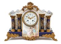 A French Gilt Metal Mounted Porcelain Mantel Clock Width 15 1/2 inches. — 19TH/20TH CENTURY