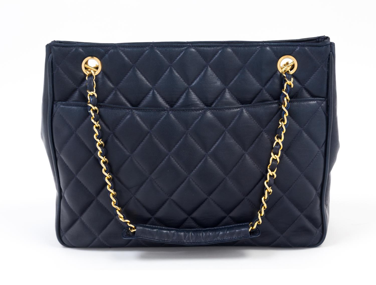 A Chanel Navy Quilted Leather Tote Handbag, 12" x 8" x 2"; Strap drop: 7".