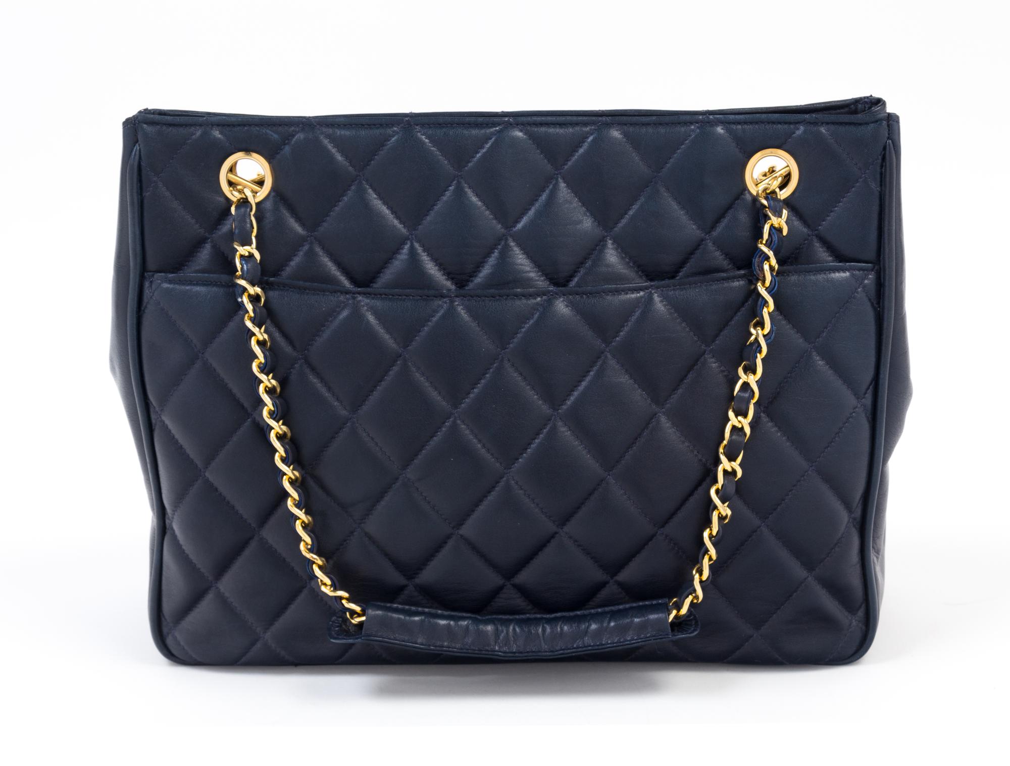 A Chanel Navy Quilted Leather Tote Handbag, 12" x 8" x 2"; Strap drop: 7".