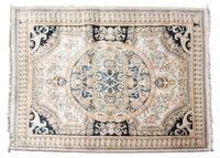 A Louis XVI Design Wool Rug by Safavieh 12 feet 5 inches x 9 feet.