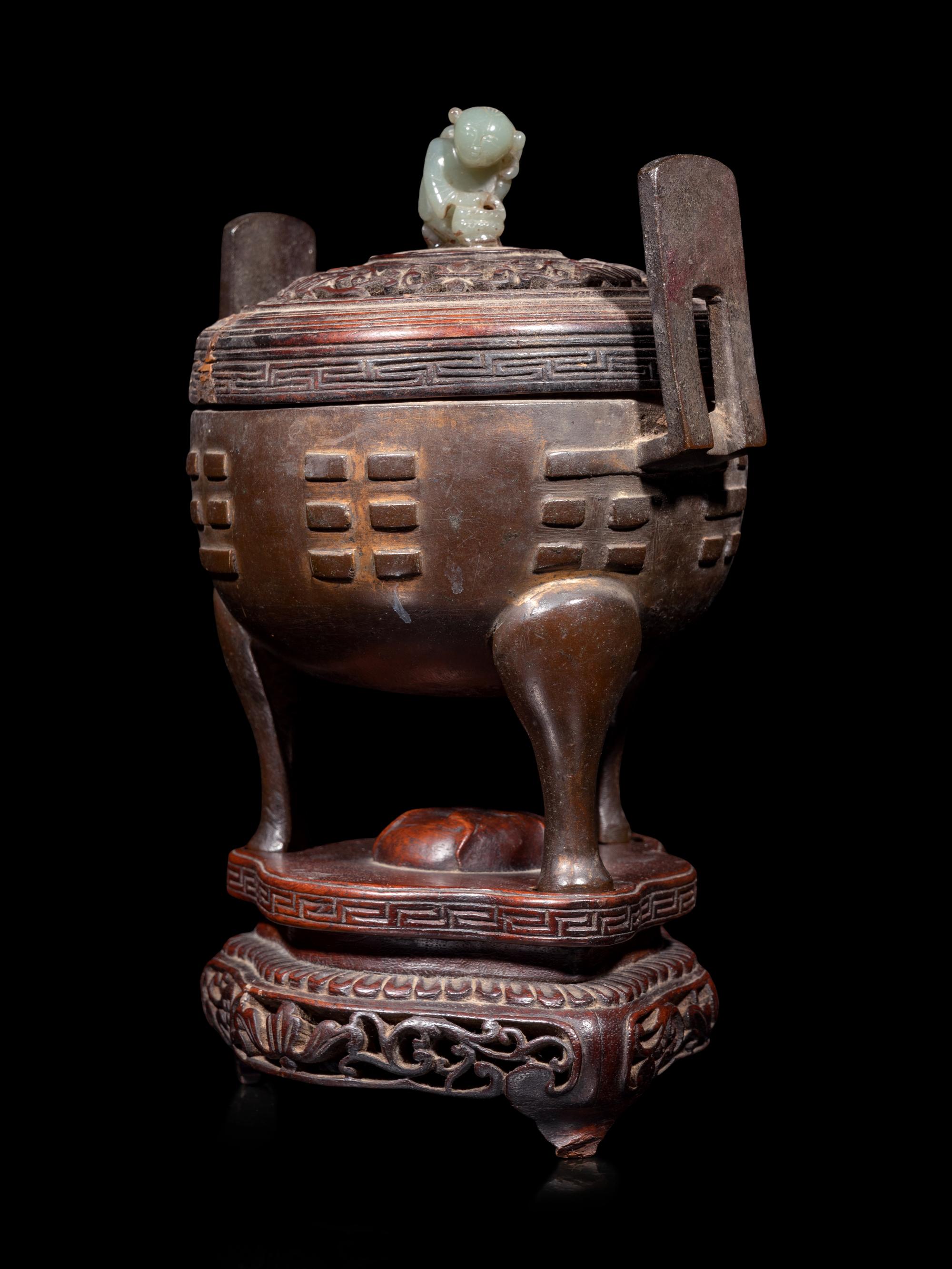A Chinese Cast Bronze Tripod Incense Burner