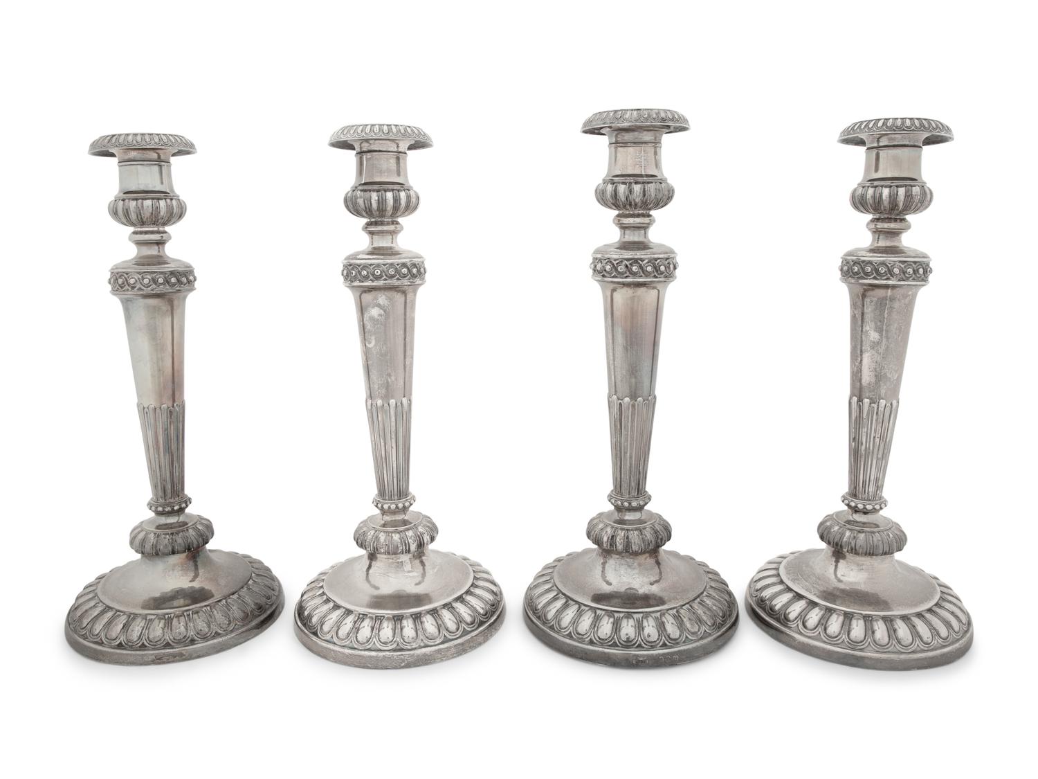 A Set of Four Victorian Silver Candlesticks
