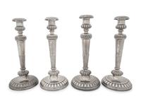 A Set of Four Victorian Silver Candlesticks