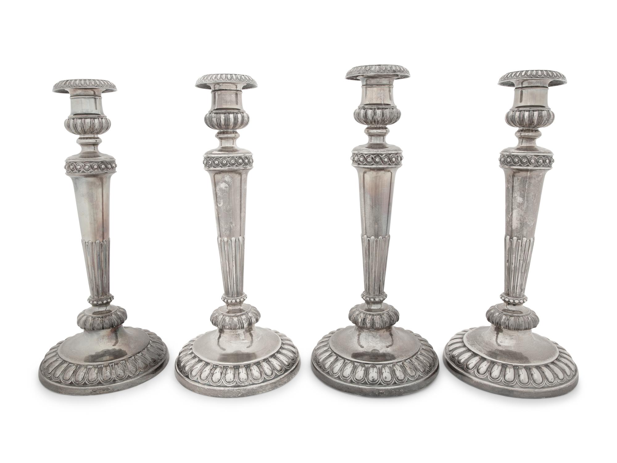 A Set of Four Victorian Silver Candlesticks