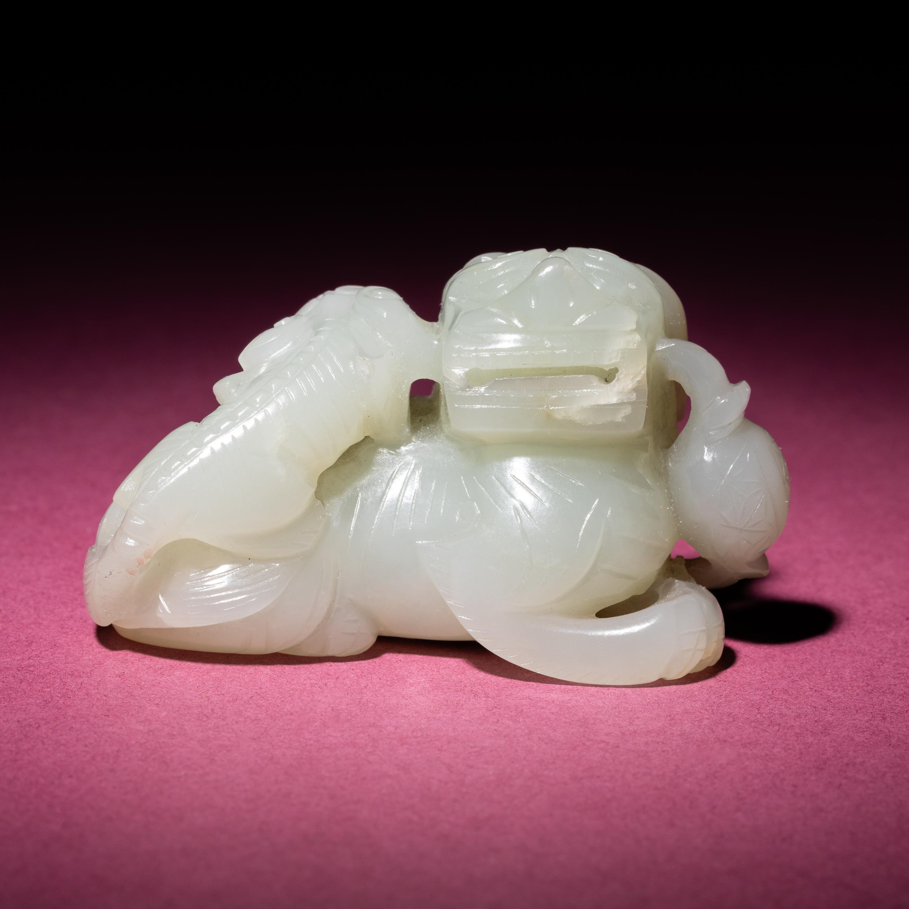 A Chinese Pale Celadon Jade Group of Fu Lions, Qing Dynasty — 清 青白玉太獅少獅把件